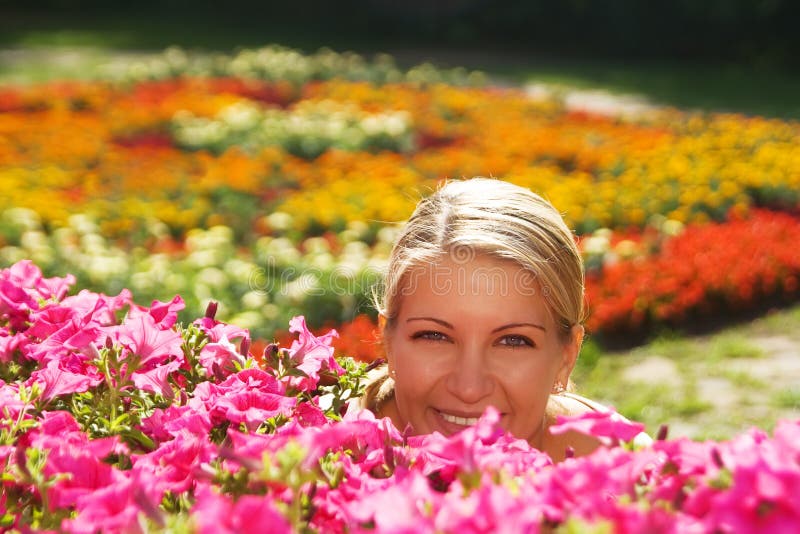 The woman in flower garden