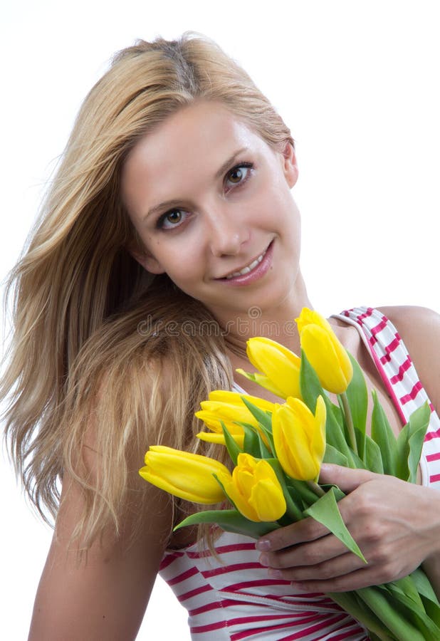 Woman with flowers yellow spring tulips bouquet royalty free stock image Woman with flowers yellow spring tulips bouquet royalty free stock image