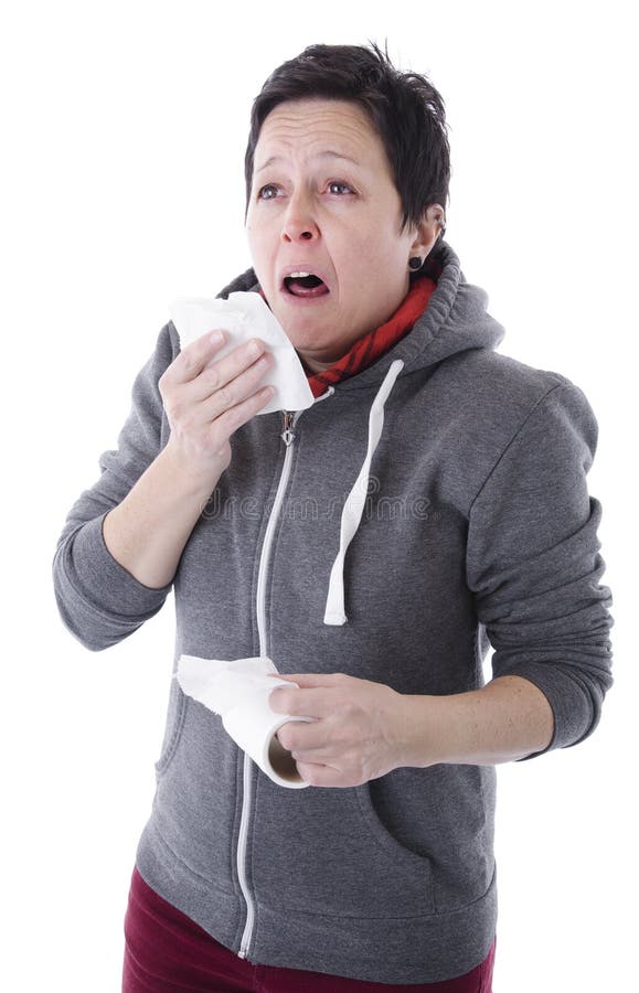 Woman with flu sneezing royalty free stock image