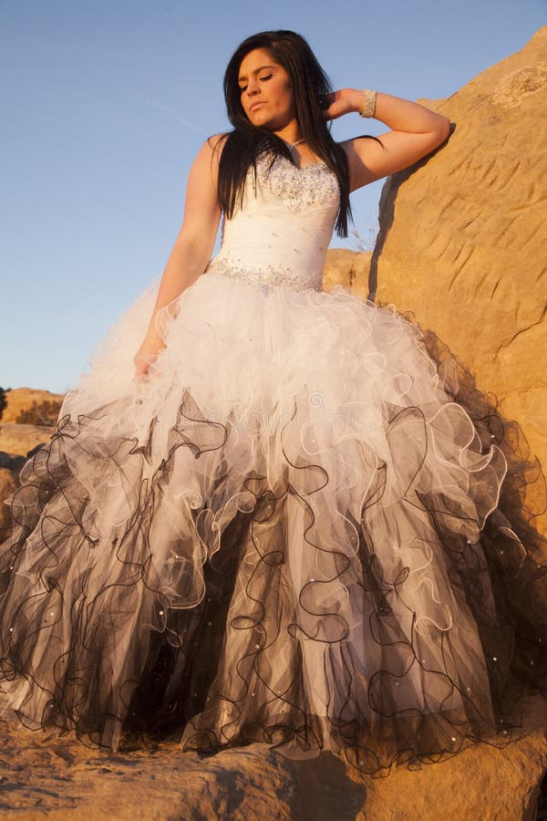 Woman formal rocks look down royalty free stock images Woman formal rocks look down royalty free stock images