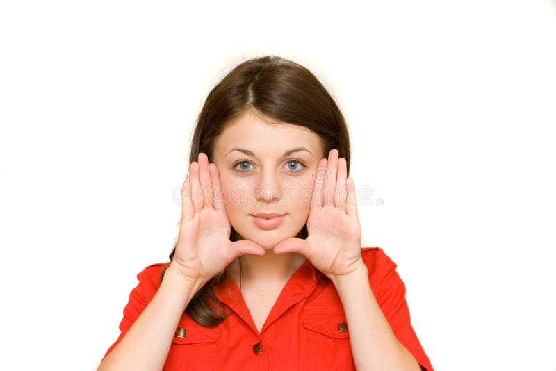 Woman framing her face with her palms