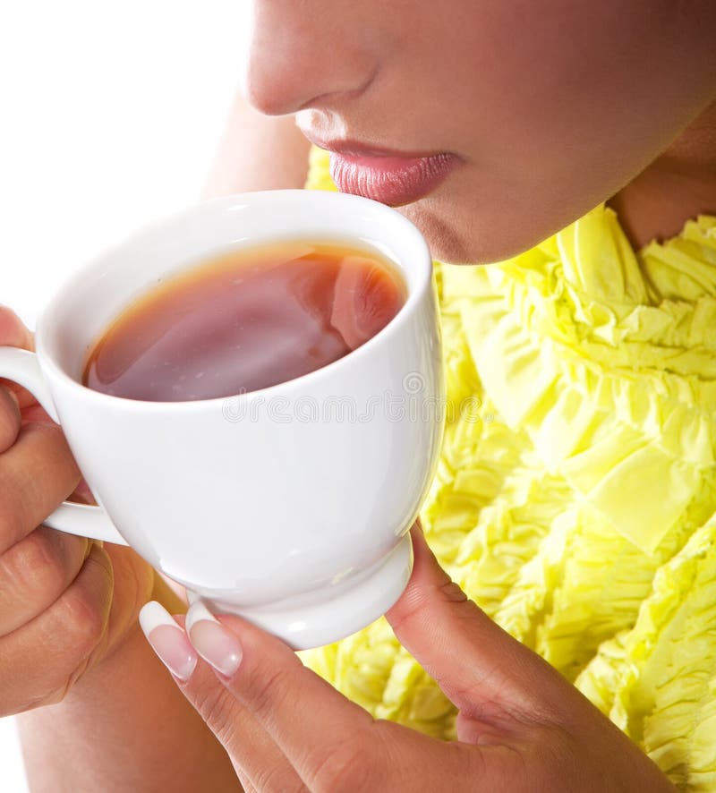 Woman with fresh cup of tea