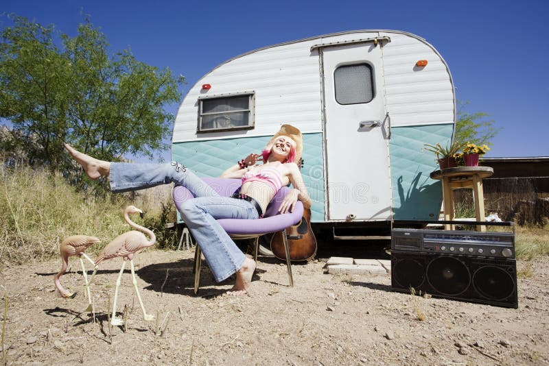 Woman in front of Travel Trailer