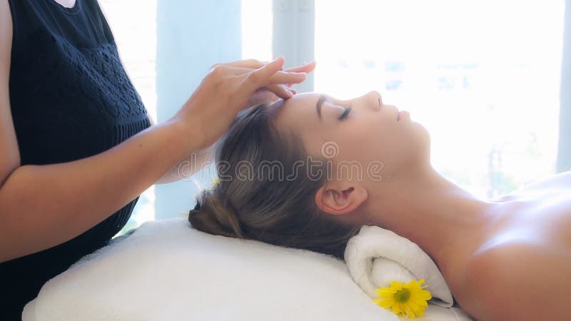 Woman Gets Facial And Head Massage In Luxury Spa Stock Image Image Of Center Facial 197659139