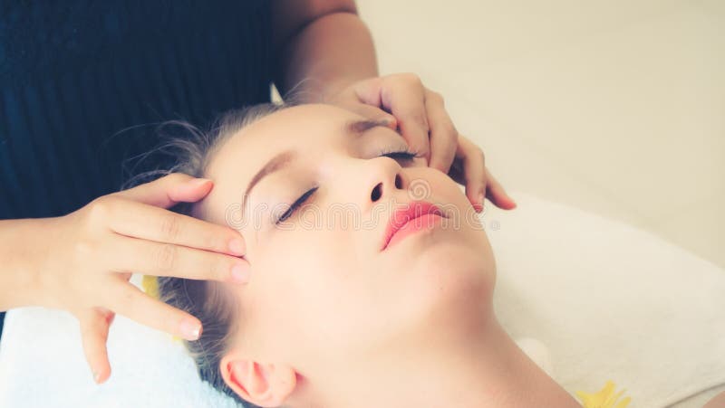 Woman Gets Facial And Head Massage In Luxury Spa Stock Image Image Of Aromatherapy Female