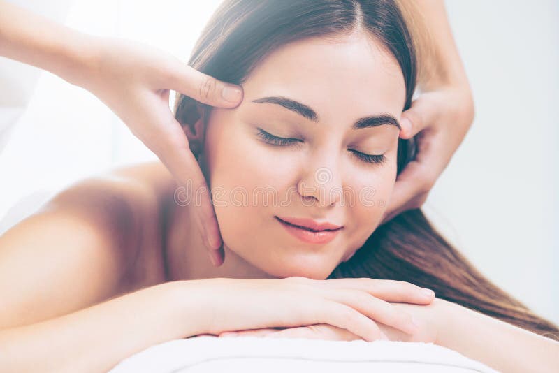 Woman Gets Facial And Head Massage In Luxury Spa Stock Image Image Of Facial Face 200381701