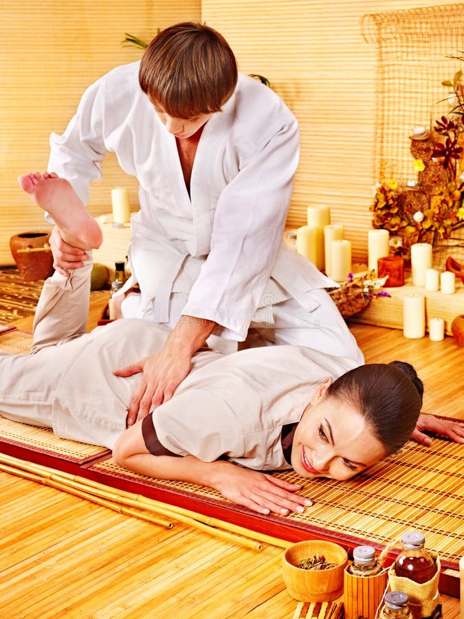 Feet Massage with Thai Reflexology. Top View of Luxury Foot Therapy