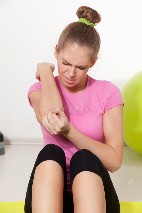 Woman getting hurt during workout