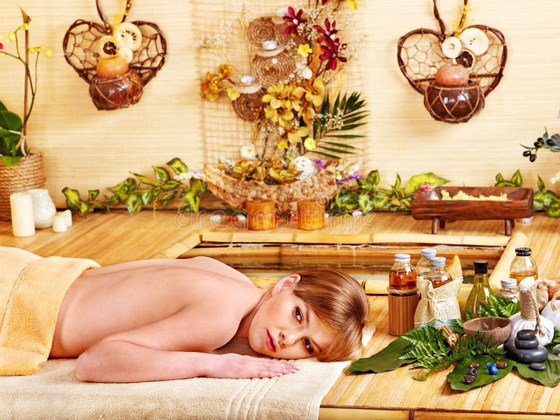 Woman Getting Massage in Bamboo Spa. Stock Image Image of people