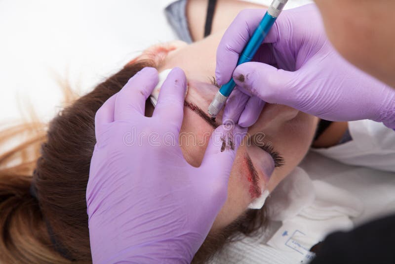 A woman getting permanent make up royalty free stock photography A woman getting permanent make up royalty free stock photography