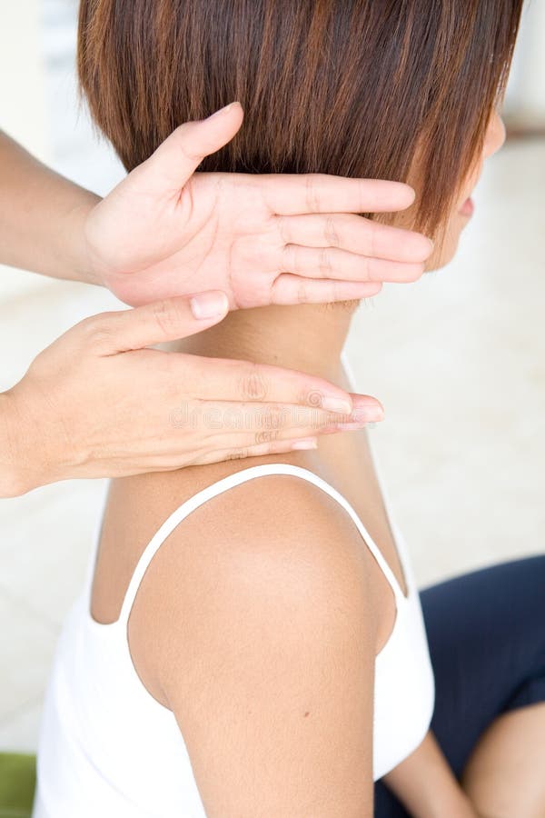 Woman getting a shoulder massage