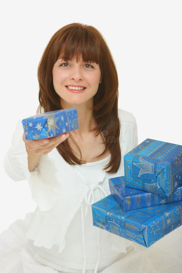 A woman giving presents