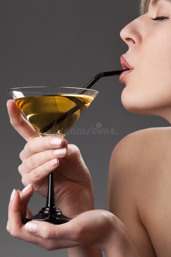 Woman with glass of cocktail