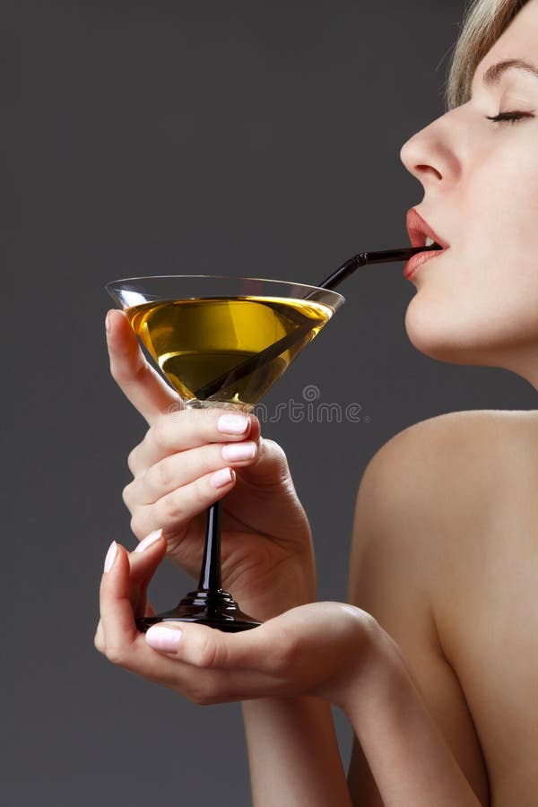 Woman with glass of cocktail