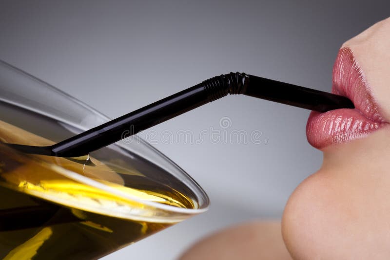 Woman with glass of cocktail