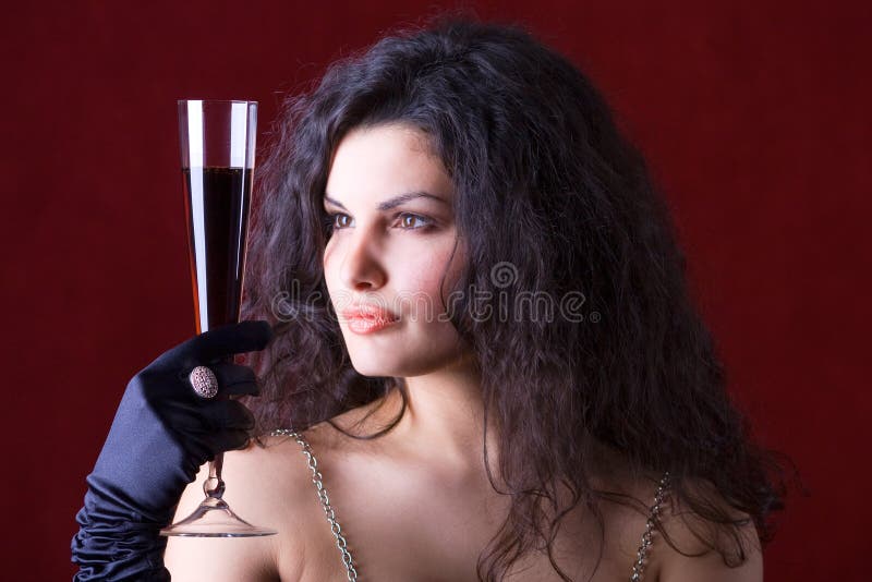 Woman with glass of red wine