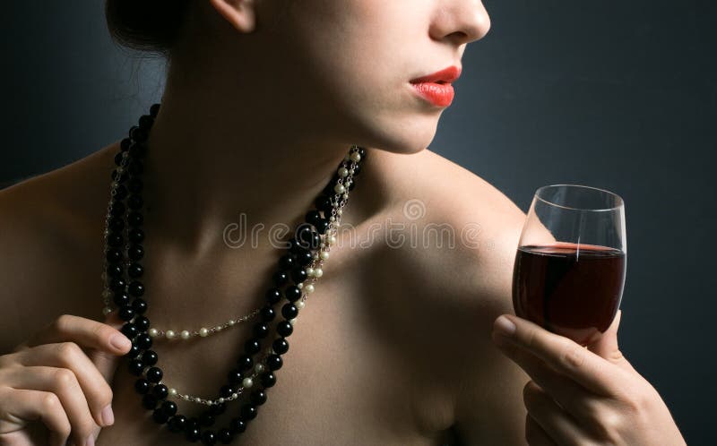 Woman with glass red wine