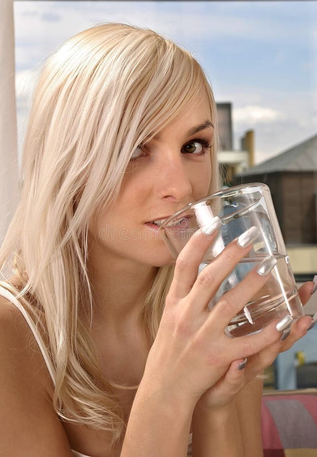 Woman with a glass of water