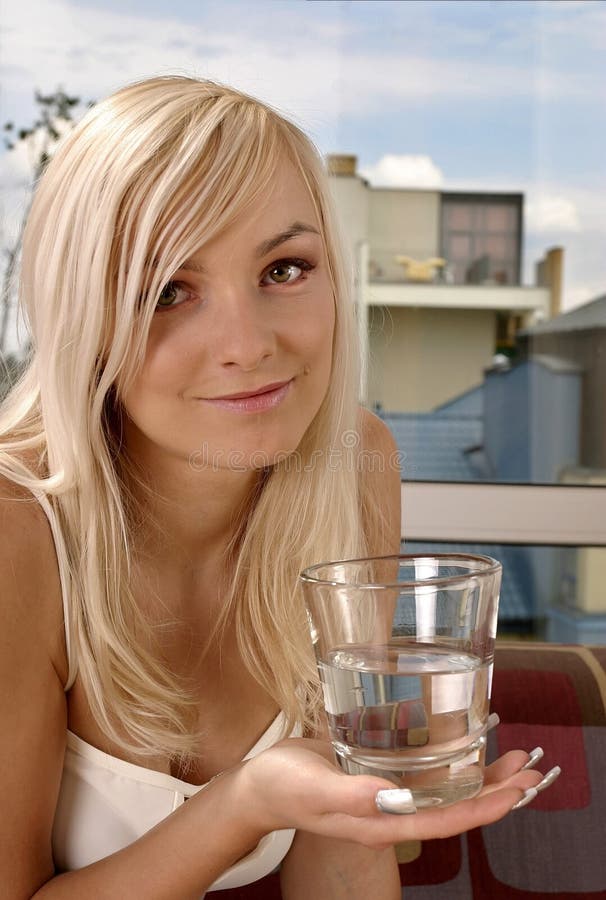 Woman with a glass of water