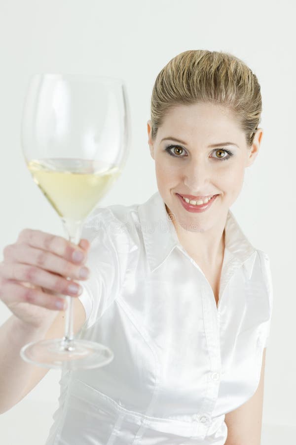 Woman with a glass of white wine