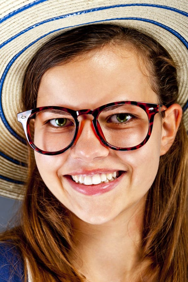 Happy Smiling Girl with Dental Braces and Glasses. Young Cute Caucasian