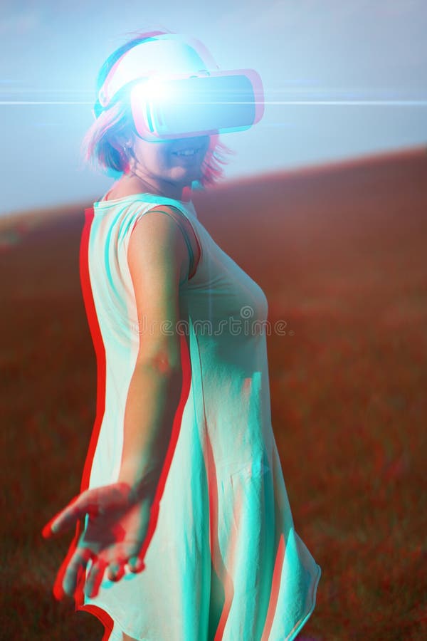 Woman Goes into Virtual Reality Using Virtual Reality Headset. Image