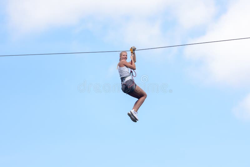 Woman going on zipline adventure royalty free stock photos Woman going on zipline adventure royalty free stock photos