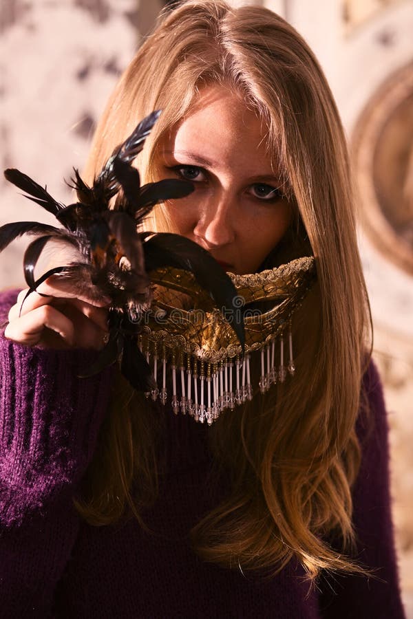Woman with gold mask. stock photo. Image of dark, young 19700530