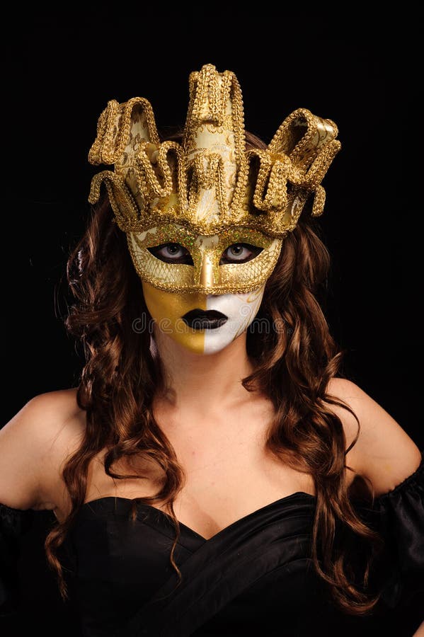Woman in golden party mask stock image. Image of face 18141443