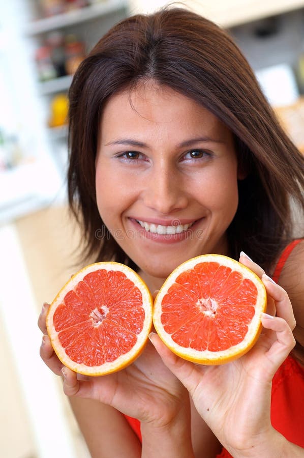 Woman with grapefruit stock photo. Image of beauty, vege 29690466
