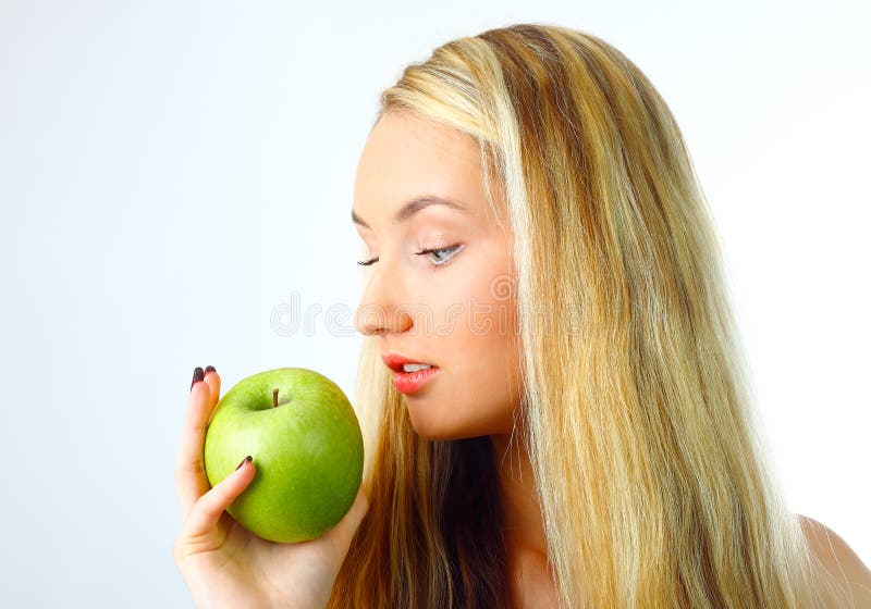 Woman with green apple.