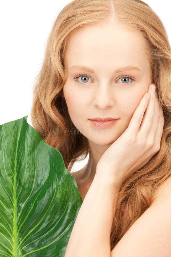 Woman with green leaf stock image. Image of living, balance 19733565