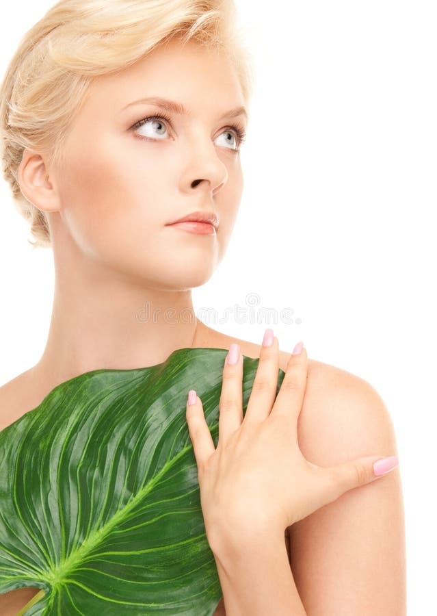 Woman with green leaf stock photo. Image of bodycare 41272236