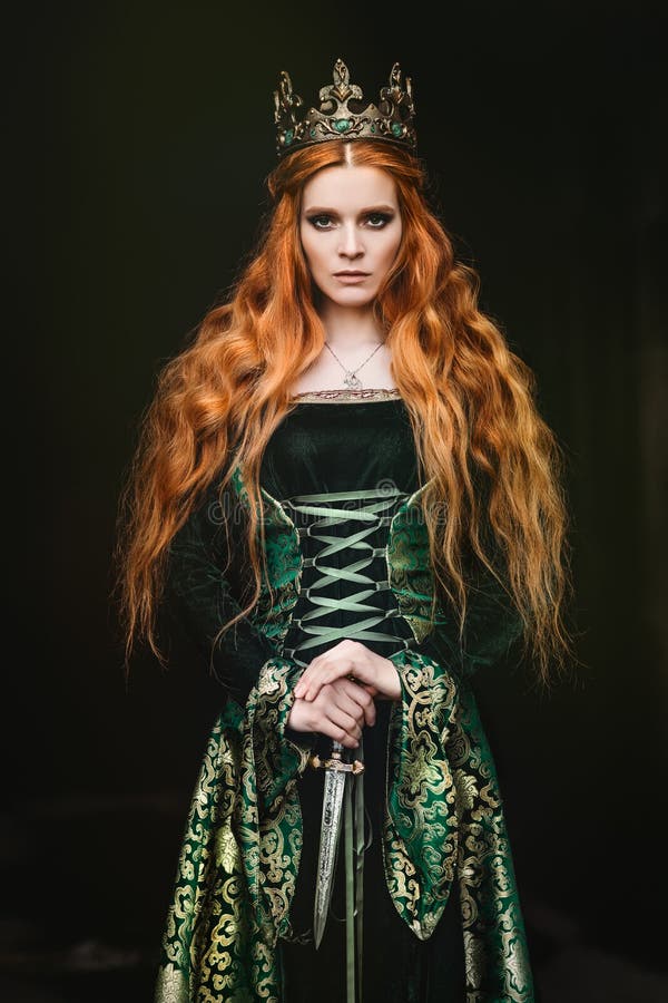 Woman in green medieval dress