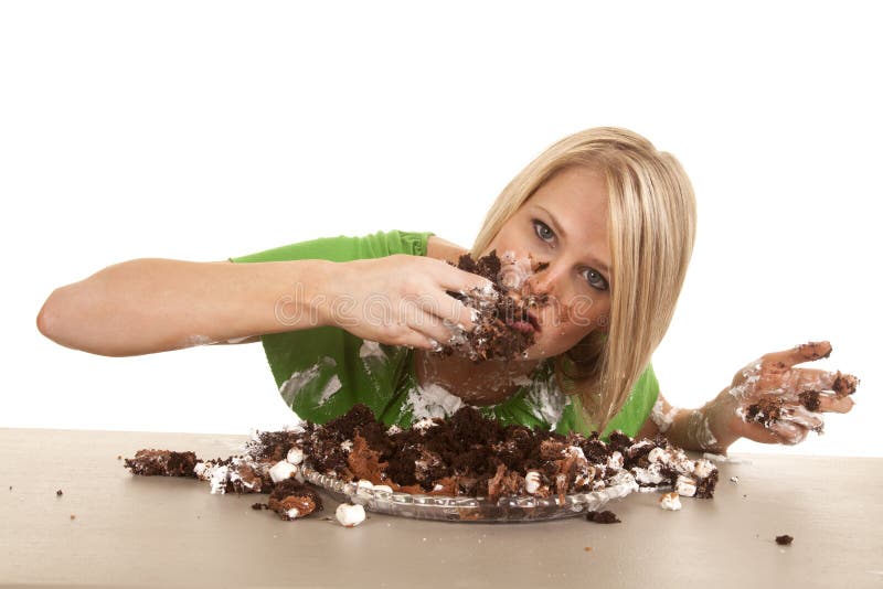 Woman green shirt with cake lean eat