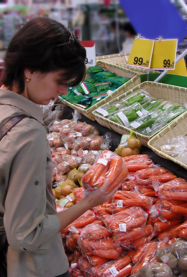 Woman at the greengrocery