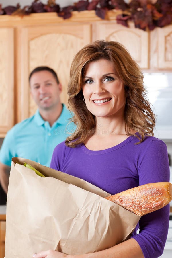 Woman with grocery stock photo