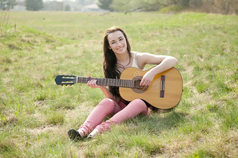 Woman with guitar stock images Woman with guitar stock images