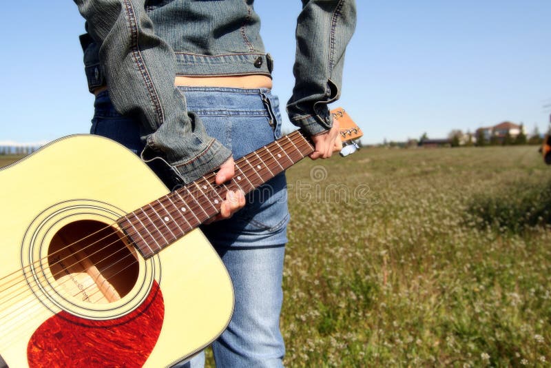 Woman guitar player stock photo Woman guitar player stock photo