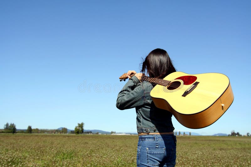 Woman guitar player royalty free stock photography Woman guitar player royalty free stock photography