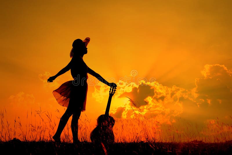 Download Woman And Guitar With Sunset Silhouette Royalty Free Stock ...