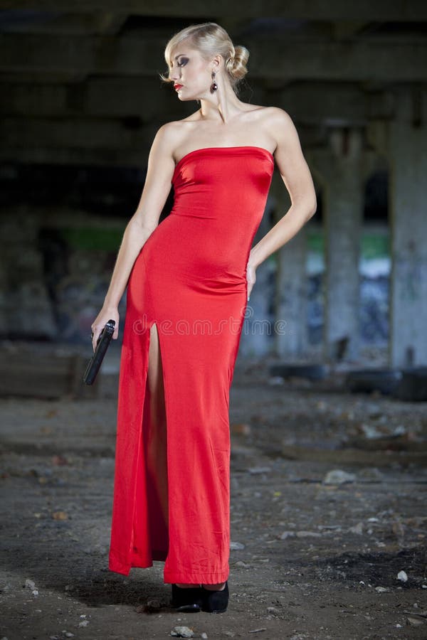 Woman with gun in red dress