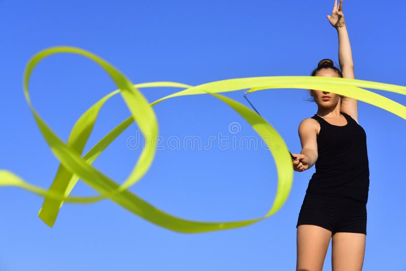 Woman with ribbon for rhythmic gymnastic. Workout sports