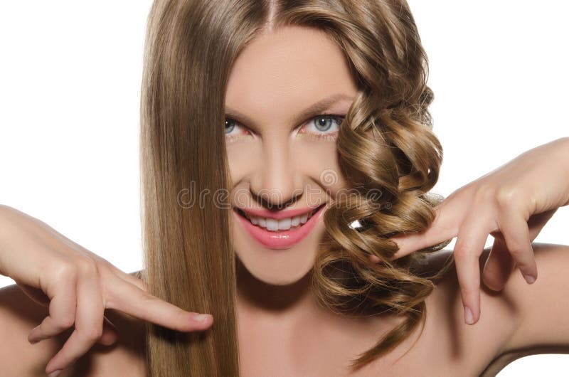 Woman with haircut keeps hair in hands