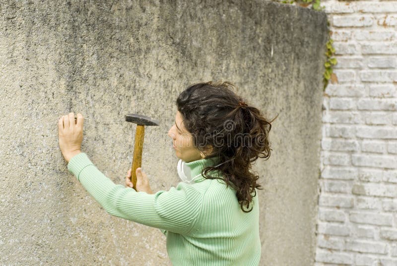 Woman Hammers Nail into Wall - Horizontal Stock Photo - Image of ethnic, latin: 6063308 Woman Hammers Nail into Wall - Horizontal Stock Photo - Image of ethnic, latin: 6063308