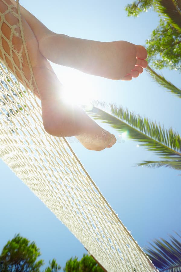 Woman on hammock stock image