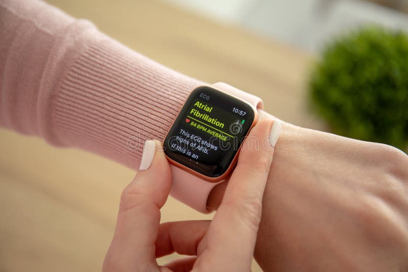 Woman hand with Apple Watch Series 4 with ECG app stock photos