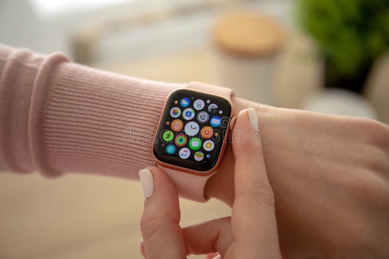 Woman hand with Apple Watch Series 4 finger touching screen stock images Woman hand with Apple Watch Series 4 finger touching screen stock images