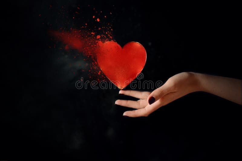 Woman Hand Balancing Broken Heart with Dust and Explosion Stock Image -  Image of effect, break: 205270709