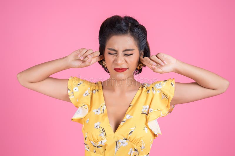 woman hand cover her ears